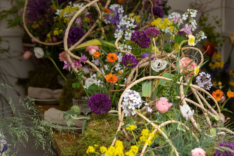 A group of flowers in a basket