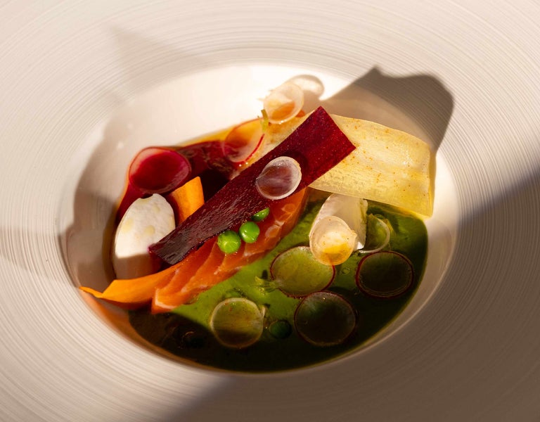 A plate of food on a white surface