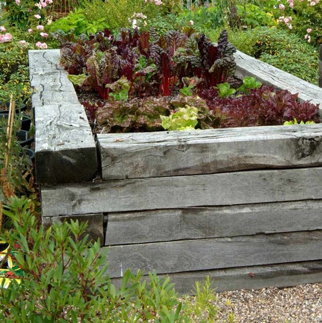 Beds built from sleepers are sturdy and attractive
