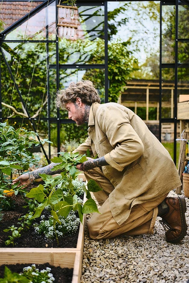 Jamie Walton, aka Nettles & Petals, in his garden