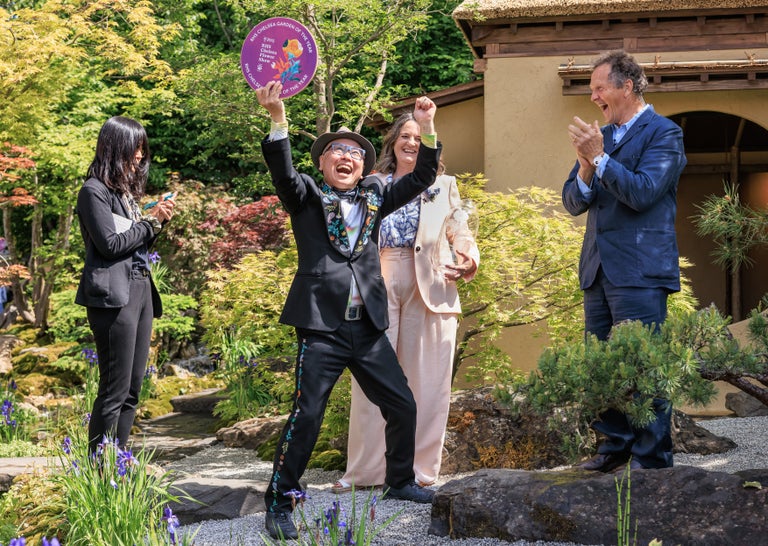 A group of people standing outside