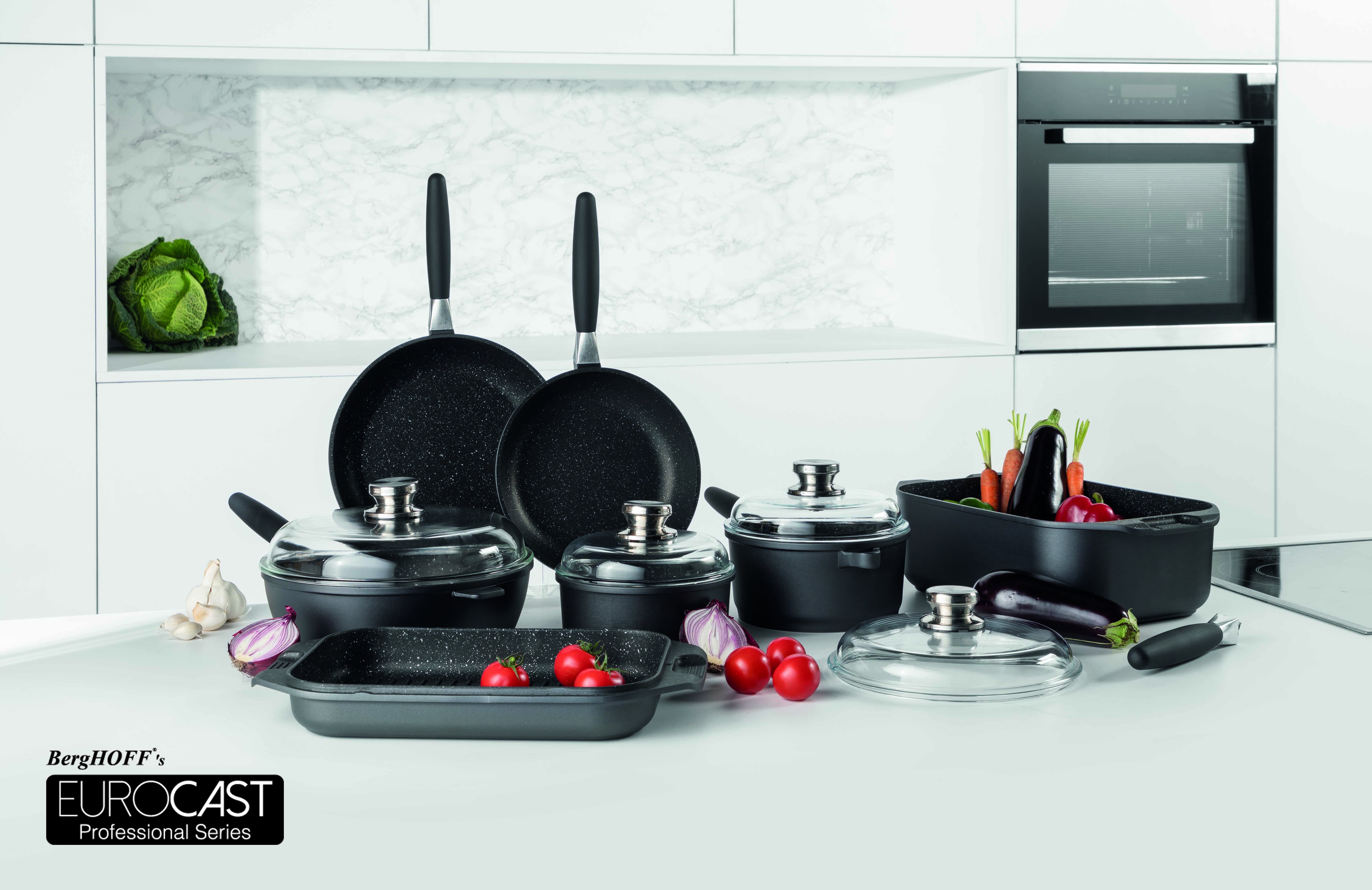 A group of pots and pans on a counter