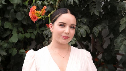 A woman in a white shirt