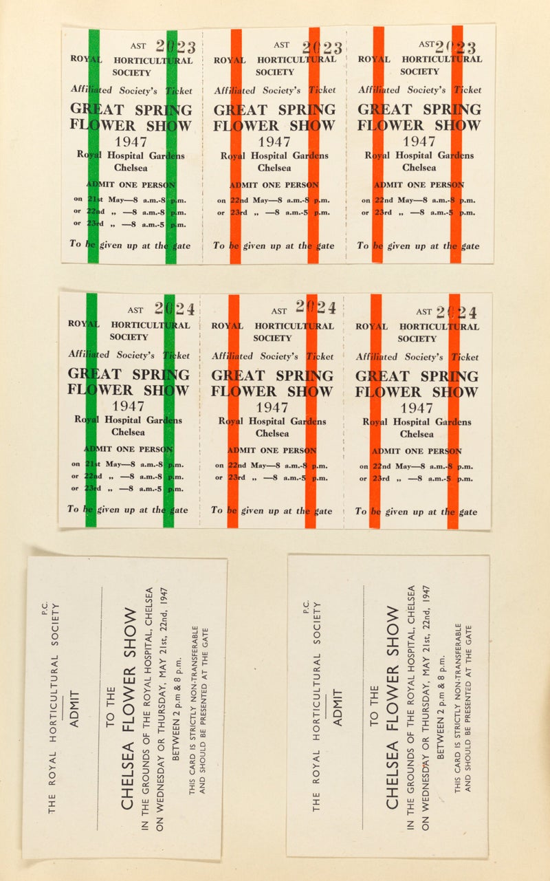 A group of tickets with red and green strips