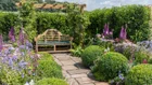 Thumbnail: A bench in a garden
