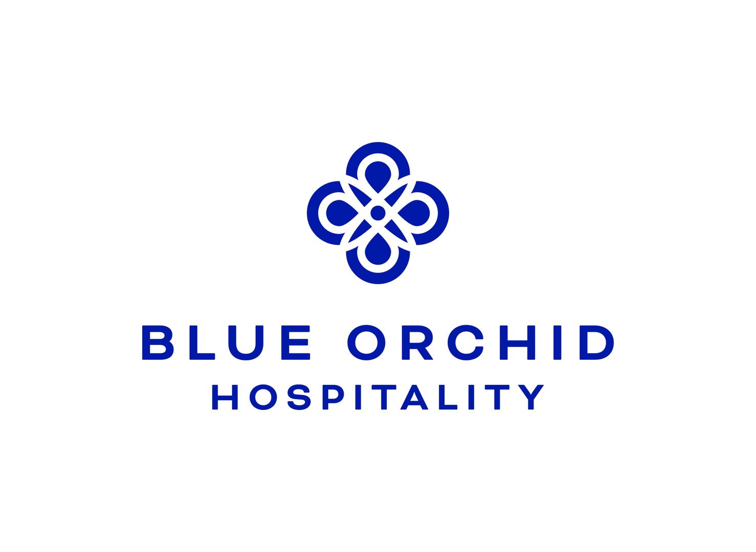 A blue logo with a flower