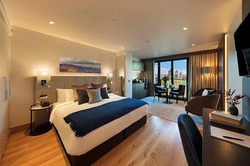 A room with a bed and a table