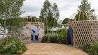 Thumbnail: A two round structures with a blue cover
